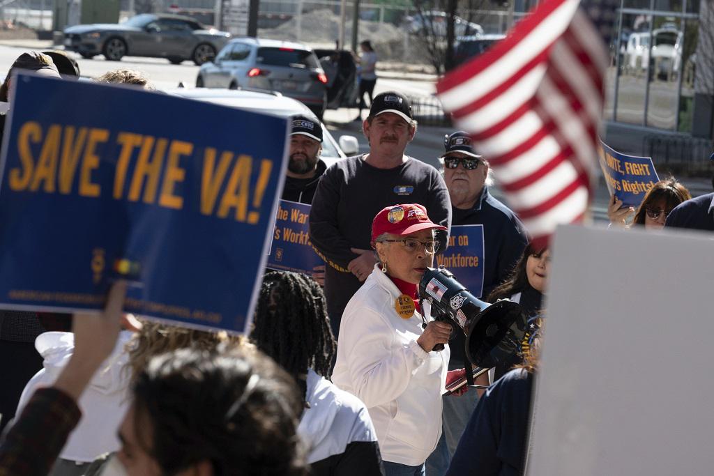 AFGE Local 2328 President Dr. Shelia Elliot leads Union members and supporters in protest against DOGE cuts outside Rep. Jennifer Kiggans’s (R-VA) office in Virginia Beach, Virginia, March 22, 2025.